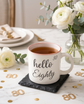 Coffee cup and engraved stone coaster set